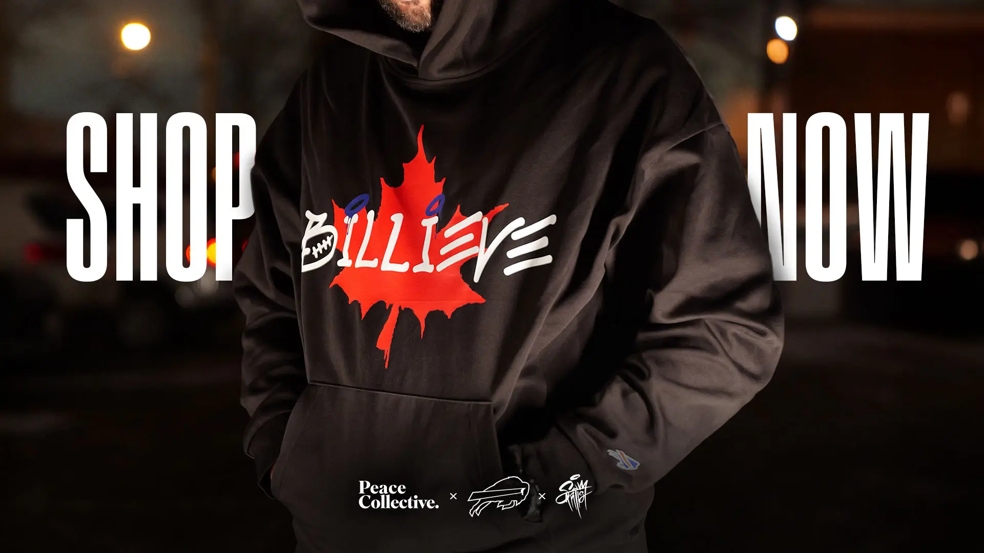 Une personne portant un sweat à capuche avec une feuille d'érable et le mot "BILLIEVE" imprimé dessus, avec "MAGASINEZ MAINTENANT" en texte gras.